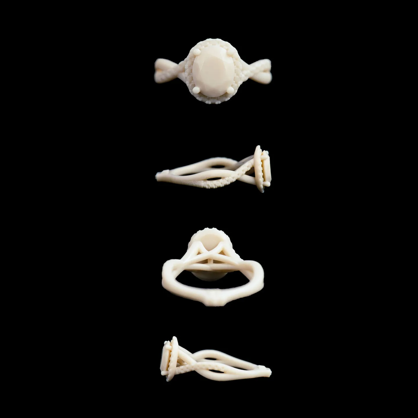 Custom engagement ring resin replica: four views of an oval halo ring model with a twisted pavé band
